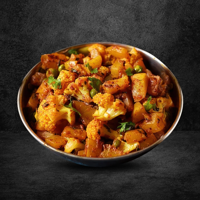 Golden aloo gobi, a hearty north indian food near me served with crispy cauliflower and spiced potatoes