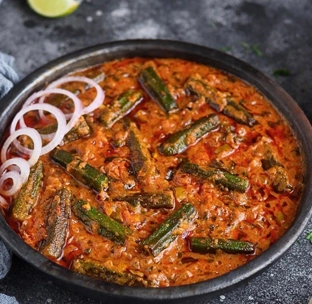 Flavourful bhindi masala gravy with okra simmered in spiced tomato and onion sauce at best indian food in singapore