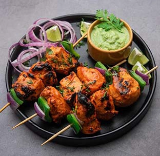 Classic indian chicken tikka kebab grilled to perfection at best mexican restaurant in singapore