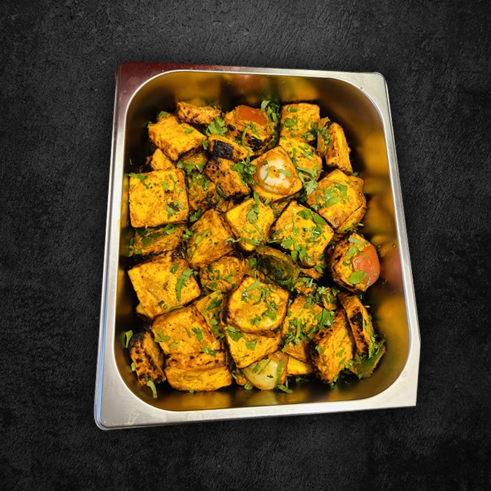Sizzling tandoori chicken platter with tikka and kababs a must try beyond mexican food near me options