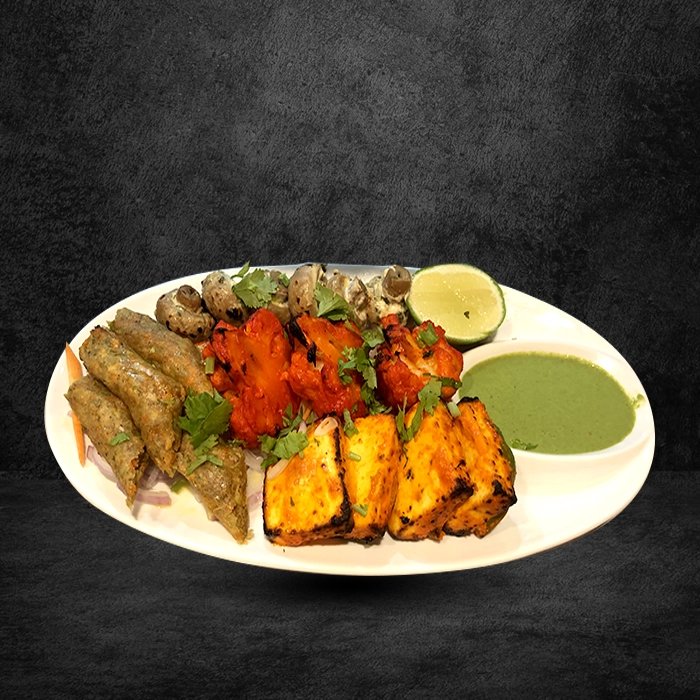 Tender chicken shawarma wraps topped with black olives served in a large tray for buffet catering singapore