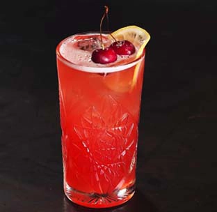Classic singapore sling cocktail with gin and cherry liqueur served at best mexican restaurant in singapore