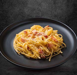 Classic italian spaghetti carbonara with cured pork cheese and egg at western restaurant singapore